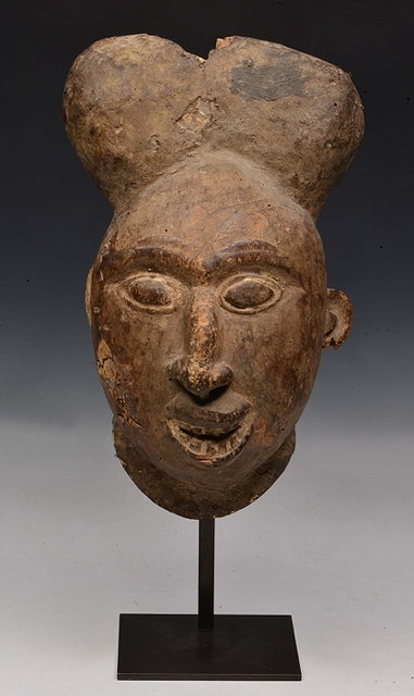 Appraisal: A CAMEROON BANGWA TROH MASK with staring eyes and open