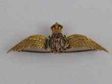 Appraisal: A gold and enamel Royal Flying Corps badge stamped carat