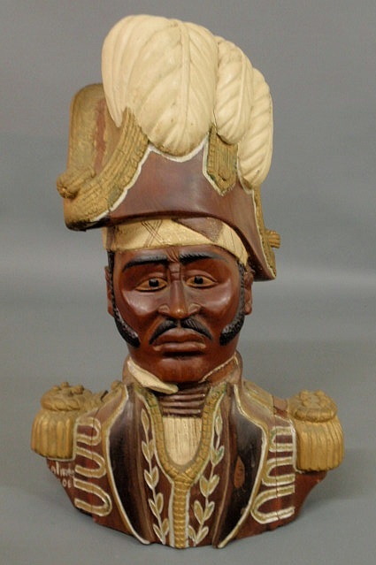 Appraisal: Carved figure of a Haitian military officer with paint decoration