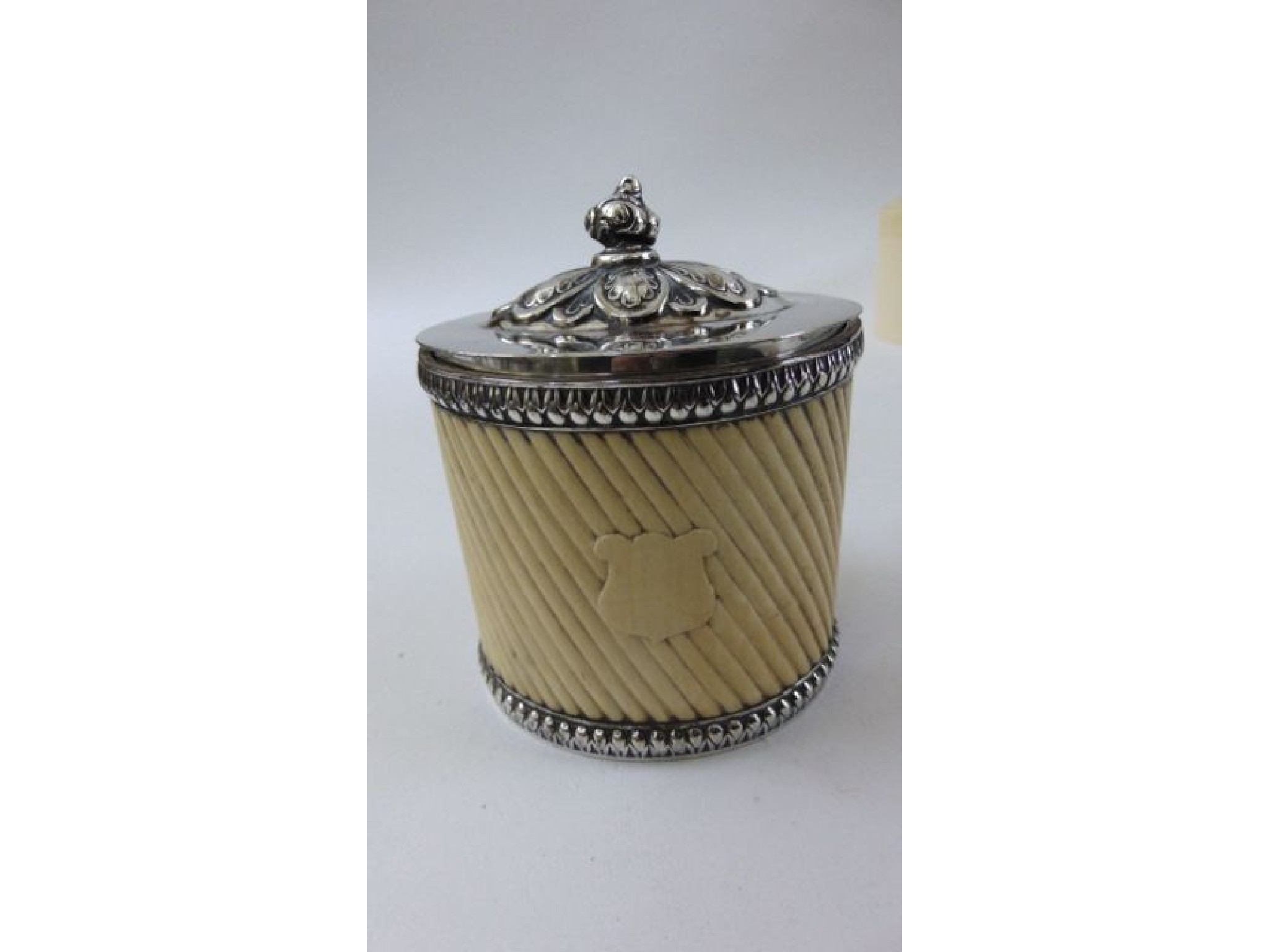 Appraisal: A th century ivory tea caddy with wrythen fluted detail