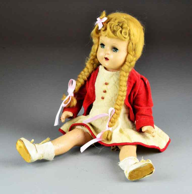 Appraisal: Antique Composition Doll with Moveable EyesHaving braided blond hair original