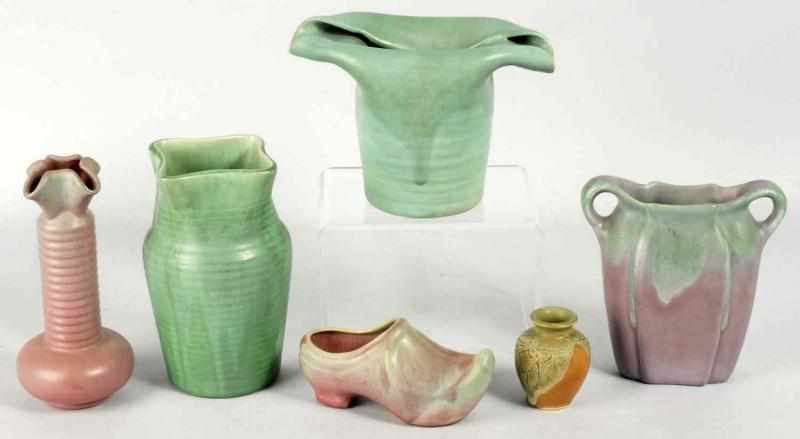 Appraisal: Lot of Muncie Pottery Pieces Description Includes one ribbed two-color