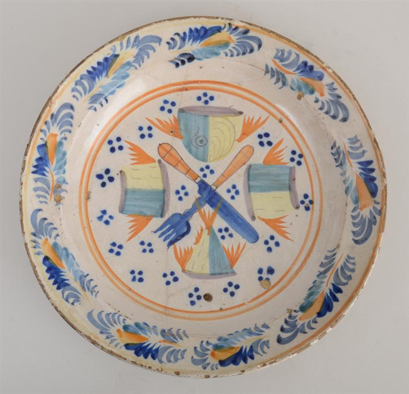 Appraisal: PORTUGUESE MAJOLICA CHARGER Centered by crossed knife and fork spaced