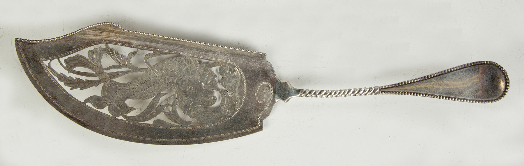 Appraisal: Early Silver Fish Slice Pierced and engraved blade with twisted