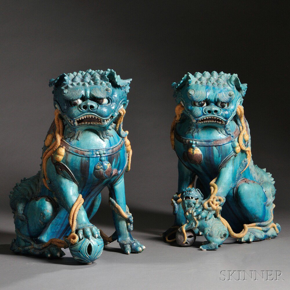 Appraisal: Pair of Large Buddhist Lions China th century glazed ceramic