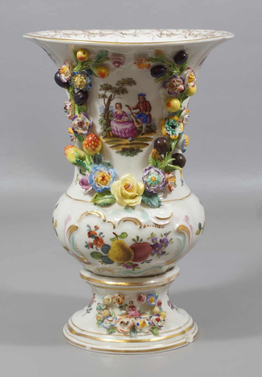 Appraisal: Continental Porcelain Vase reserves of courting couples heavily embossed fruit