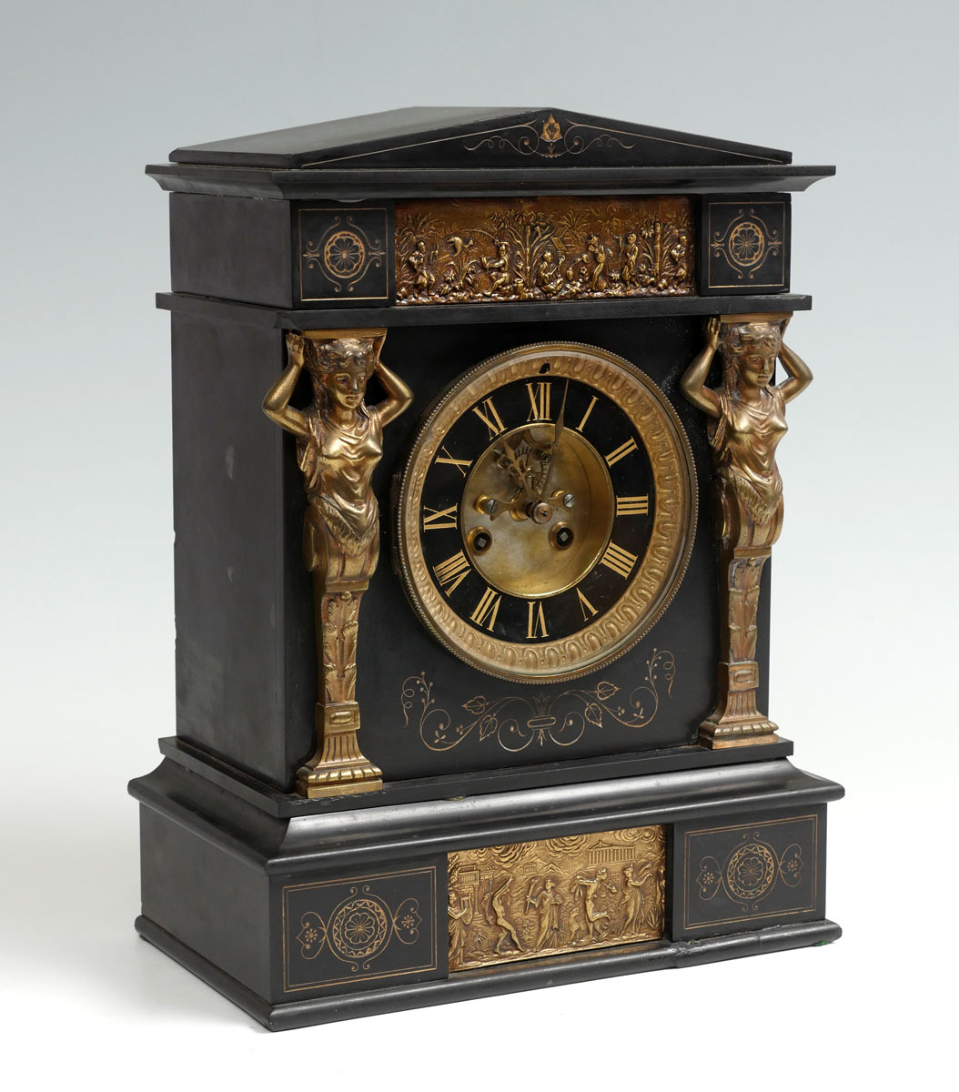 Appraisal: EGYPTIAN REVIVAL SLATE BRASS CLOCK Black slate mantle clock with