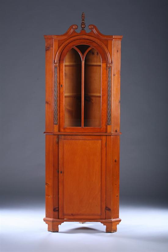 Appraisal: NEOCLASSICAL STYLE DIMINUTIVE PINE CORNER CABINET early th century Scrolling