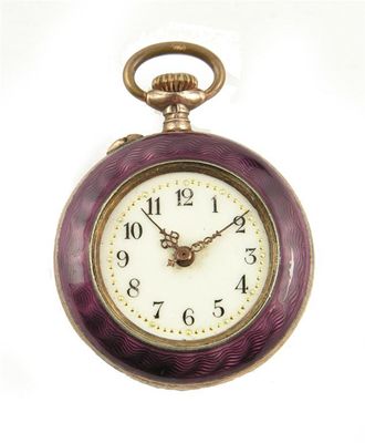 Appraisal: A Swiss silver gilt and enamel fob watch keyless cylinder