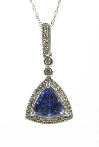 Appraisal: FOURTEEN KARAT WHITE GOLD TANZANITE AND DIAMOND PENDANT NECKLACE approximately