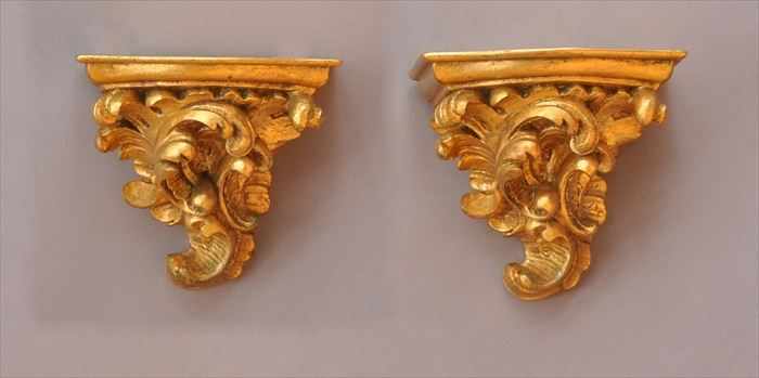 Appraisal: PAIR OF ROCOCO-STYLE GILT COMPOSITION WALL BRACKETS Each decorated with