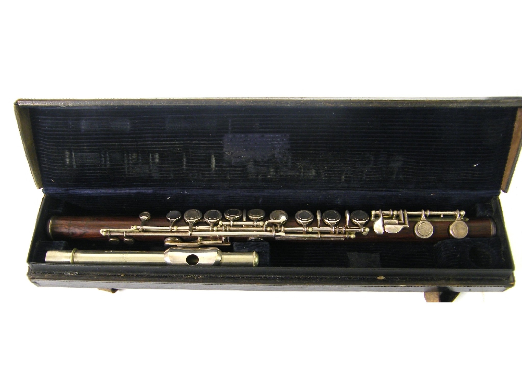 Appraisal: Rosewood Boehm system flute by and stamped Boosey Hawkes Limited