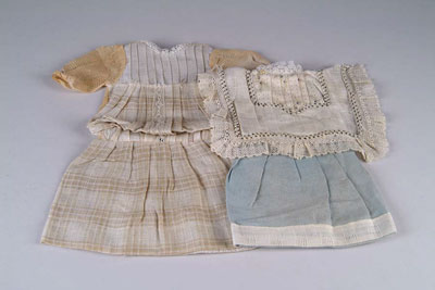 Appraisal: LOT OF ORIGINAL DOLL DRESSES Three are from turn of