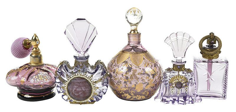 Appraisal: Five Amethyst Glass Perfume Bottles Continental early th century two