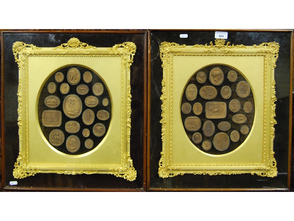 Appraisal: A pair of gilt framed displays of Neoclassical plaster relief