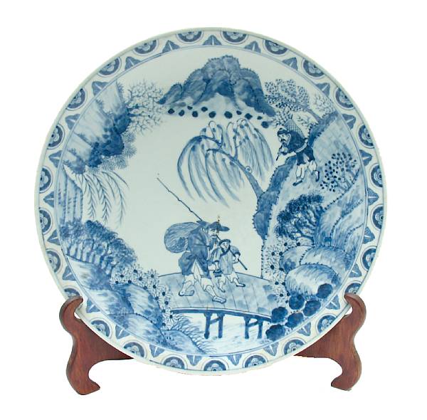 Appraisal: A Chinese blue and white porcelain dish decorated with fisherman