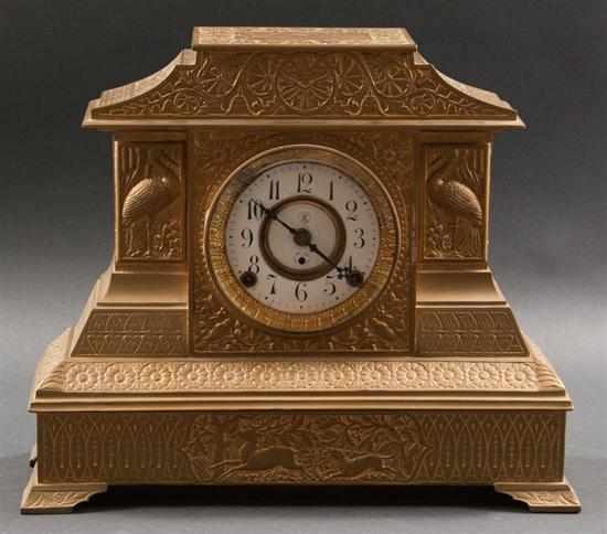 Appraisal: Arts and Crafts molded gilt sheet metal mantel clock first