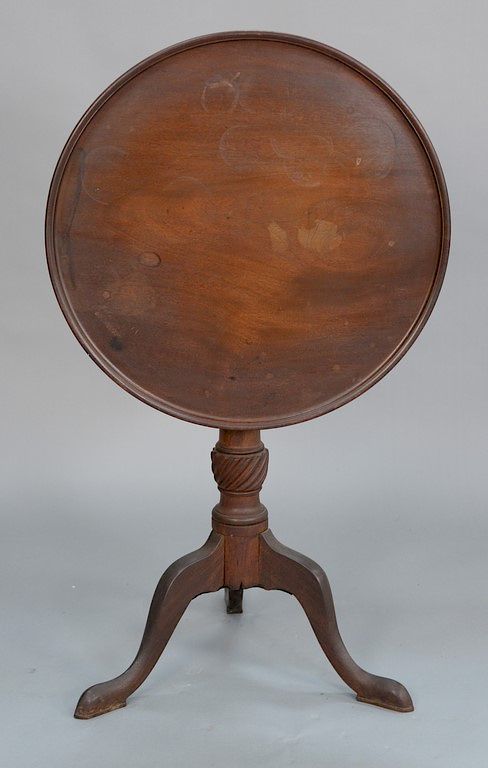 Appraisal: Federal mahogany tip stand having dish top on urn shaft