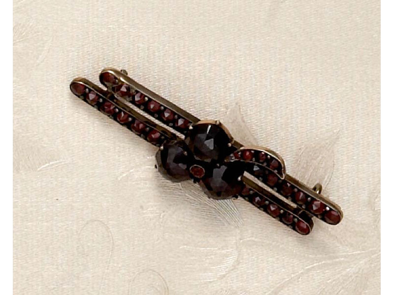 Appraisal: GARNET BROOCH Gold filled with garnets Estimate -