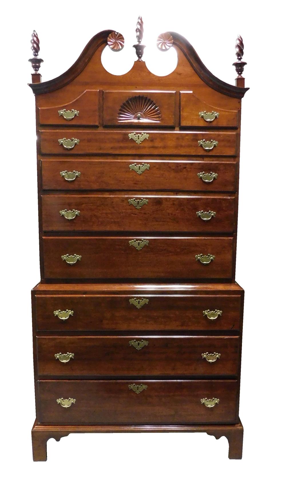 Appraisal: Chest-on-Chest c Connecticut cherry with broken arch crest containing carved