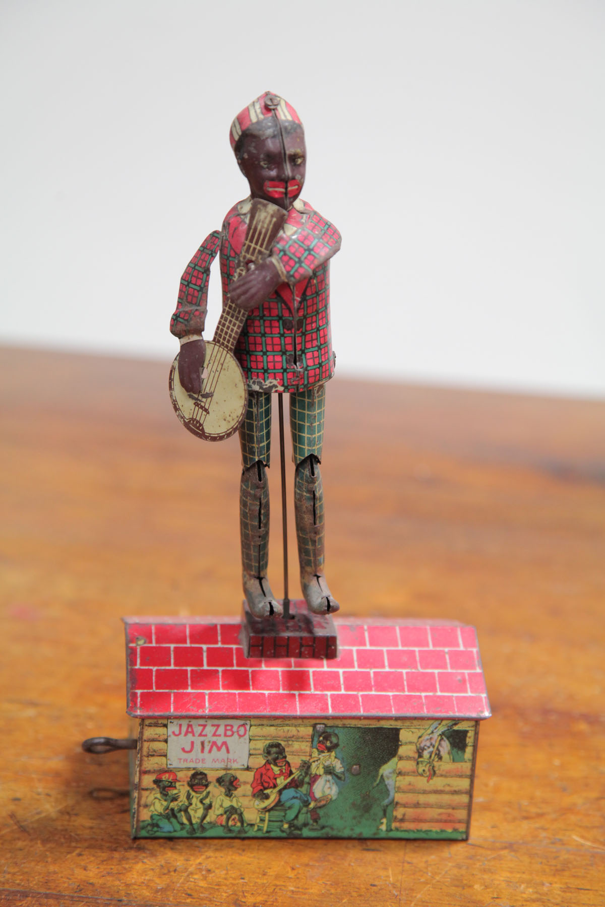 Appraisal: UNIQUE ART ''JAZZBO JIM'' TIN WIND UP TOY New Jersey