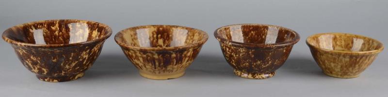 Appraisal: A Lot Of Spongeware Rockingham Glaze Bowls Four unmarked bowls