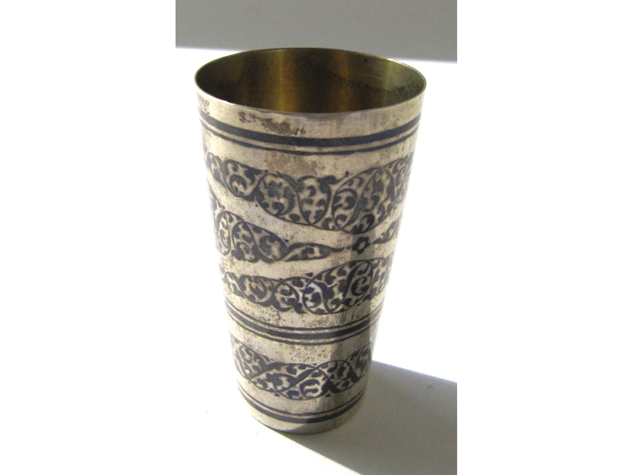 Appraisal: An Eastern white metal and Niello cup