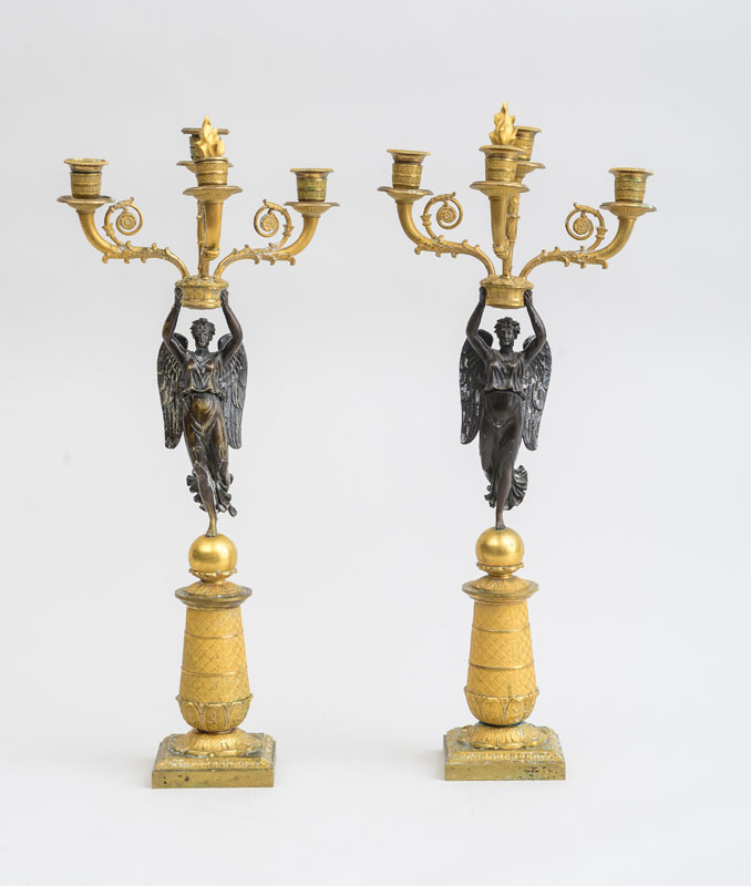 Appraisal: PAIR OF EMPIRE STYLE BRONZE AND ORMOLU FOUR-LIGHT CANDELABRA Each