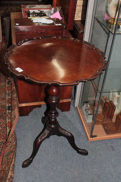 Appraisal: AN TH CENTURY STYLE MAHOGANY SNAP TOP TABLE the top