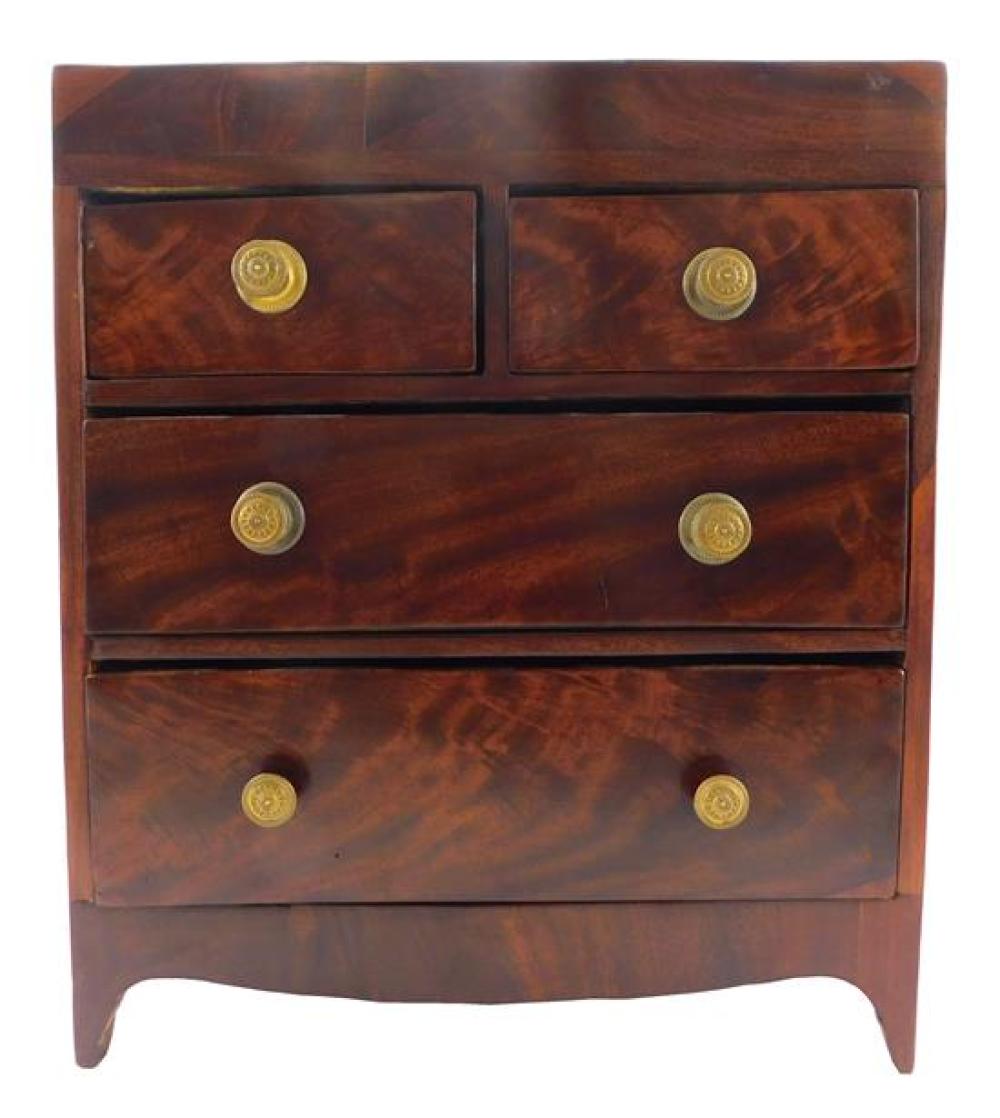 Appraisal: Diminutive chest of drawers th C mahogany and mahogany veneer