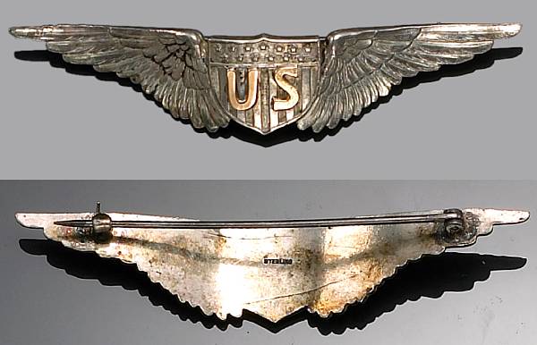 Appraisal: A World War era all metal Pilot's wing One-piece silver