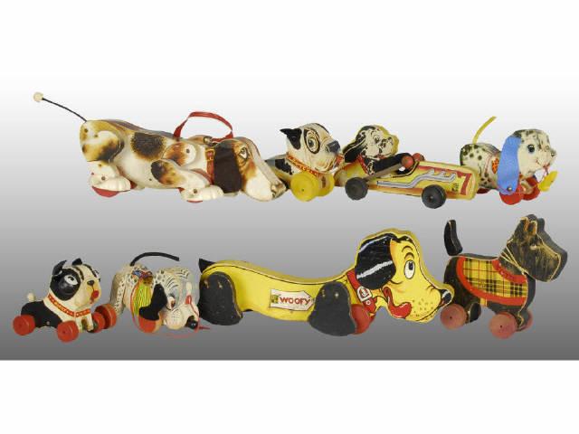 Appraisal: Lot of Fisher-Price Dog Toys Description Includes Kiltie Dog Driving