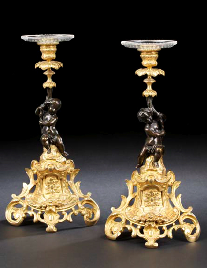 Appraisal: Pair of Napoleon III Gilt-Lacquered and Parcel-Ebonized Brass Candlesticks third