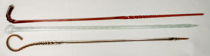 Appraisal: blown glass canes amber one aqua knop top to Estimate