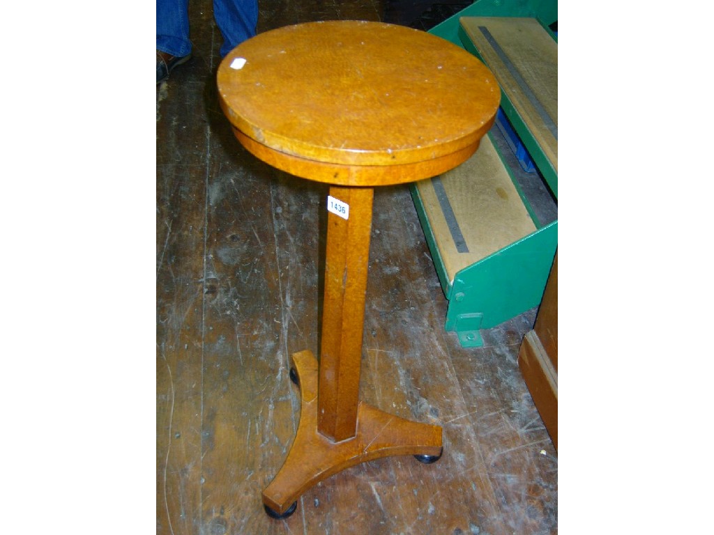 Appraisal: A Biedermeier birds eye maple veneered occasional table the circular