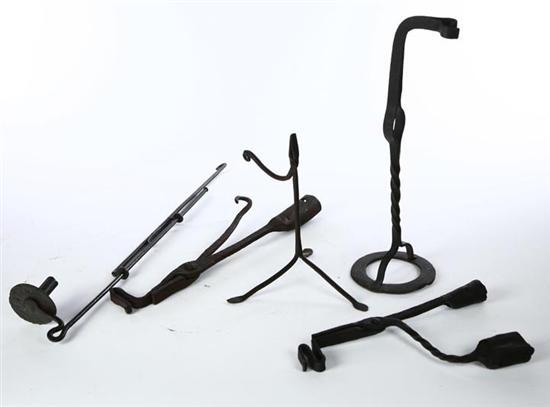 Appraisal: FIVE IRON LIGHTING DEVICES American th century wrought iron Tabletop