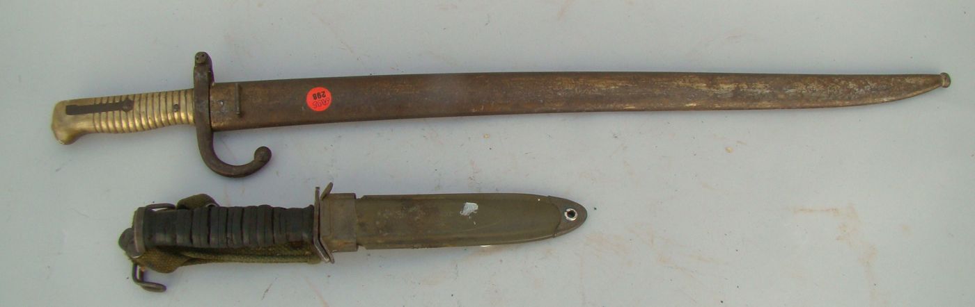 Appraisal: TWO EDGED WEAPONS U S M knife and scabbard and