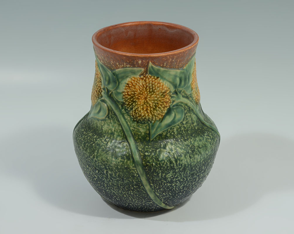 Appraisal: ROSEVILLE POTTERY SUNFLOWER VASE Unmarked Roseville vase in the Sunflower