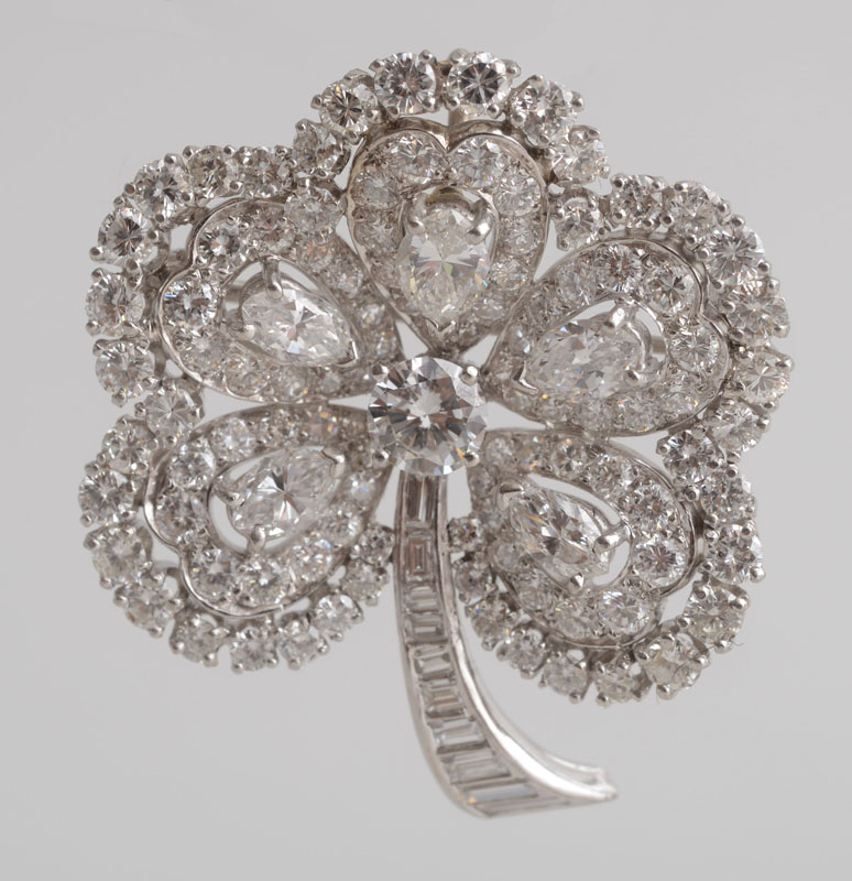 Appraisal: PLATINUM AND DIAMOND FIVE-PETAL FLOWER BROOCH With pendant hook of