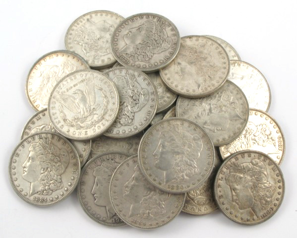 Appraisal: A ROLL OF TWENTY-FOUR U S SILVER MORGAN DOLLARS including