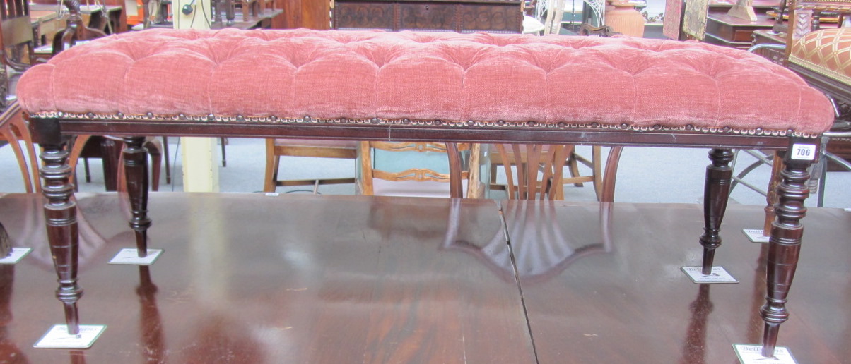 Appraisal: A pair of long stools with button upholstered tops on