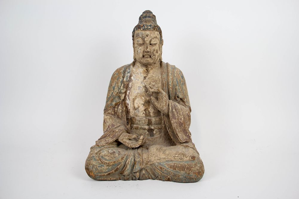 Appraisal: A Polychrome and Wood Buddha Chinese th century or earlier