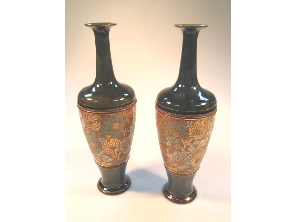 Appraisal: A pair of Doulton Slaters stoneware vases with slender everted