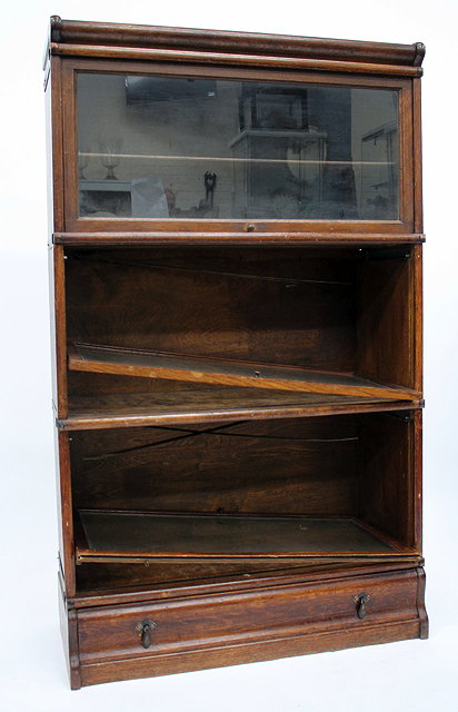 Appraisal: A LARGE SIZED OAK THREE SECTIONED GLOBE WERNICKE with glazed