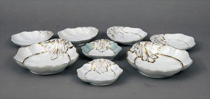 Appraisal: Set of Continental Gilt Porcelain Shell-Form Dishes Comprising a pair