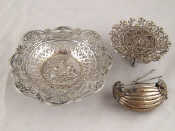 Appraisal: An embossed and pierced continental silver dish on deep foot