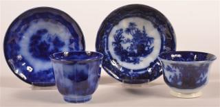 Appraisal: Two Flow Blue Transfer Dec Cups and Saucers Two Flow