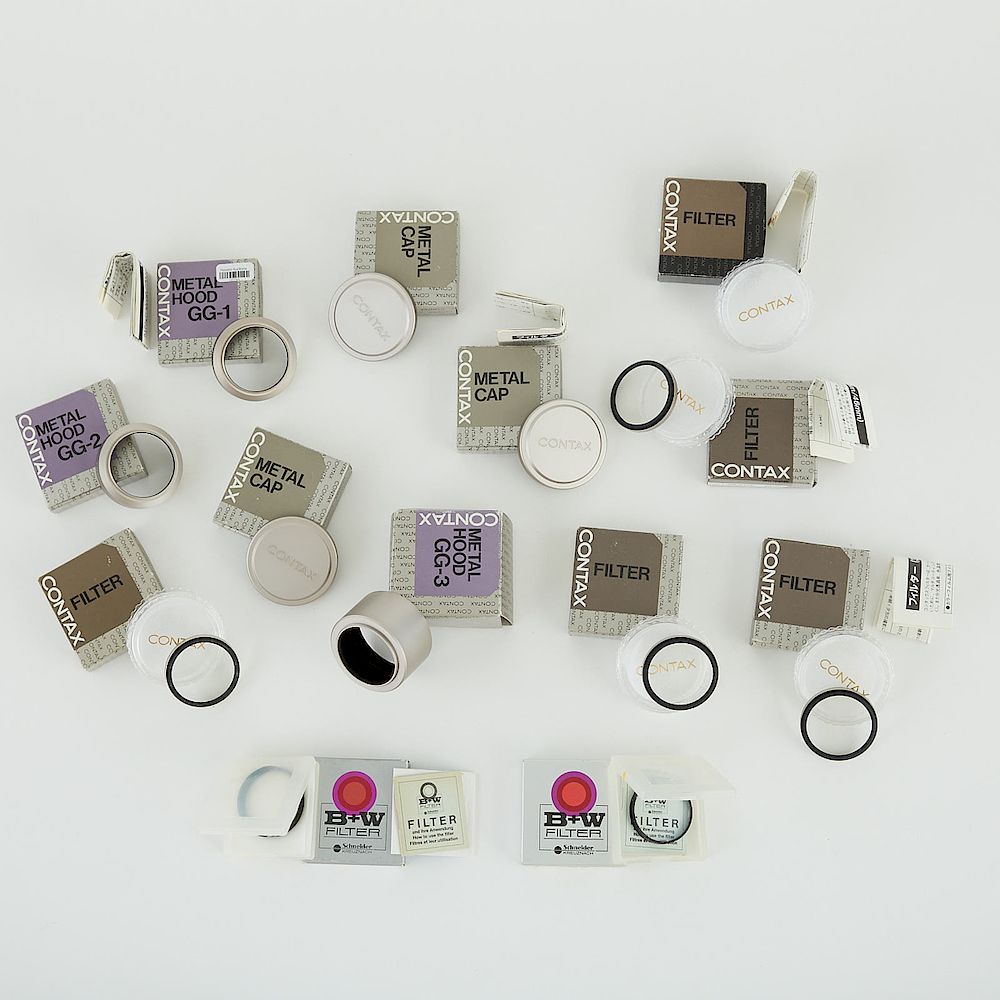 Appraisal: Group of Camera Components Hoods Filters Caps Group of fourteen