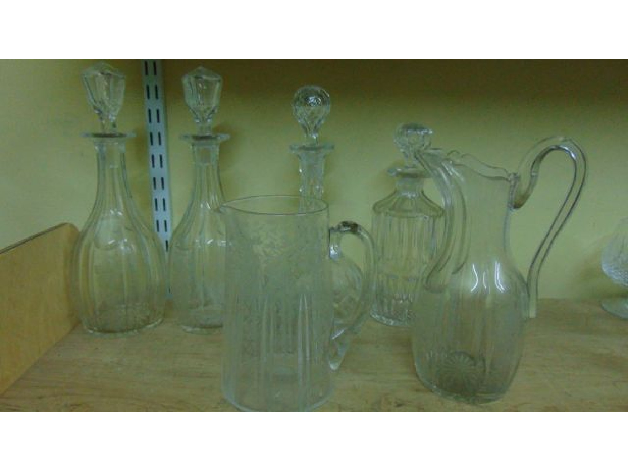 Appraisal: A pair of th century club decanters with extensive verticals