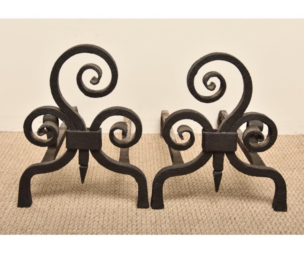 Appraisal: Large pair of wrought iron scroll form andirons each with